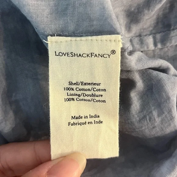 LoveShackFancy Ruffle Mini Skirt in Washed
Denim Hand Dye size L NWOT - Picture 7 of 8